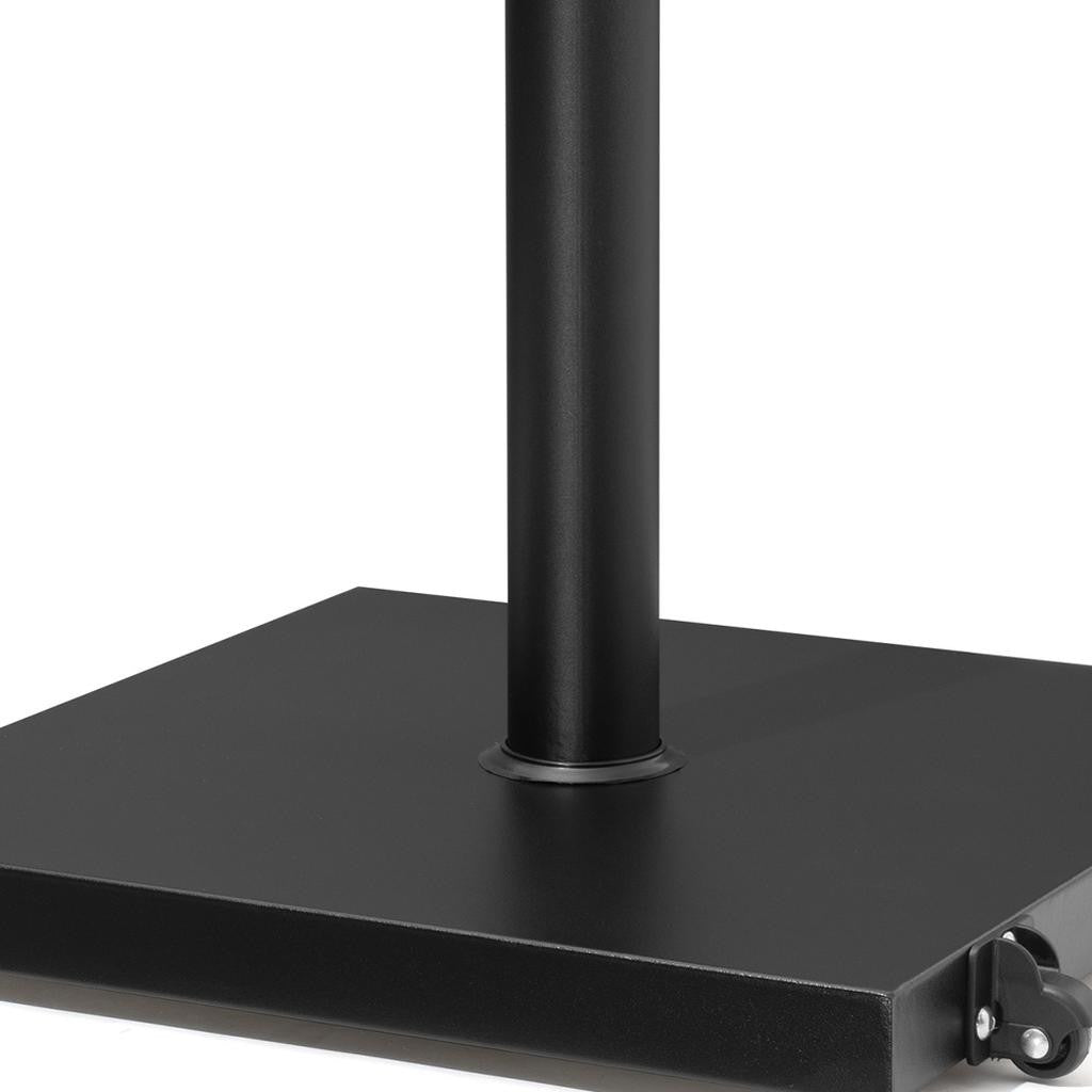 Black umbrella base close-up of square base plate and caster wheel