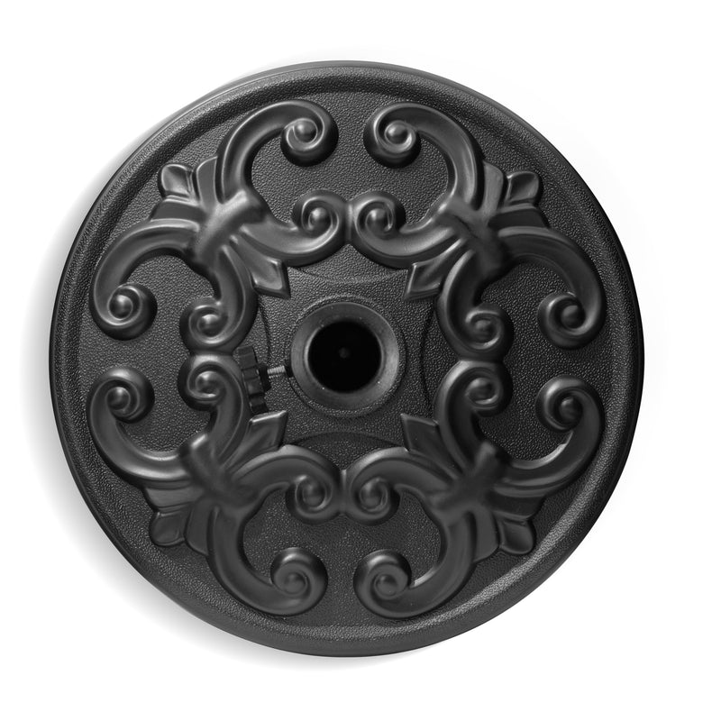 Round black umbrella base with detailed molded floral-like grip pattern and center hole