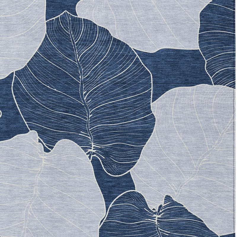 Navy and ivory leaf floral area rug with textured stitched vein details.