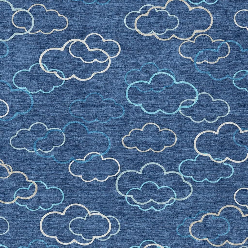 Navy area rug fabric close-up with teal and ivory cloud outlines repeating