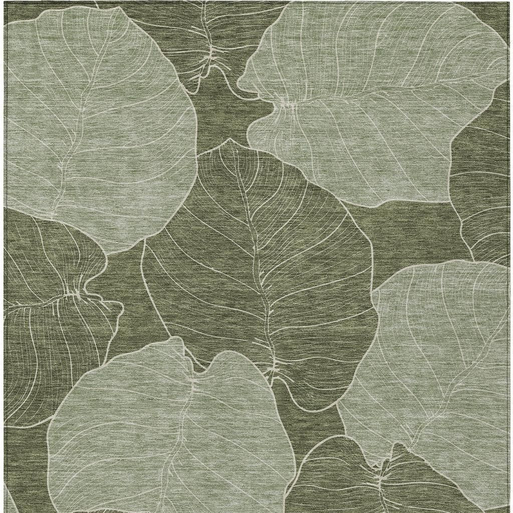 Olive green area rug with ivory leaf floral pattern and textured woven lines