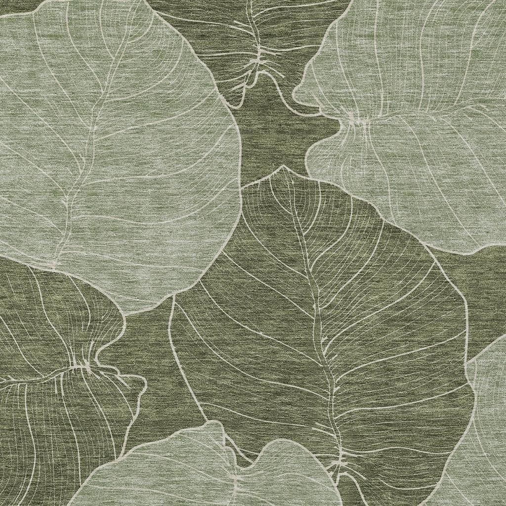 Olive green area rug with ivory leaf outlines and textured linear detailing
