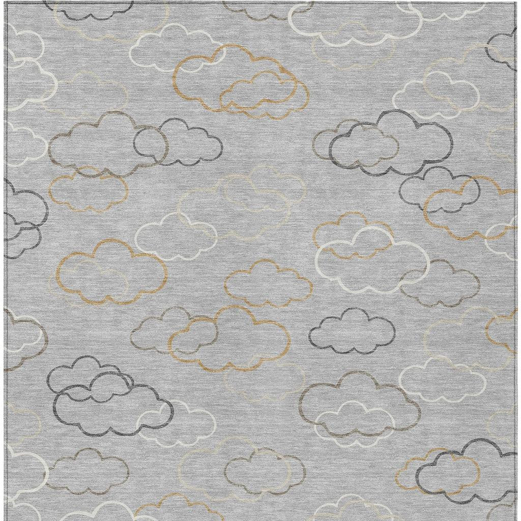 Silver washable indoor outdoor rug with scattered cloud motifs in gray and beige