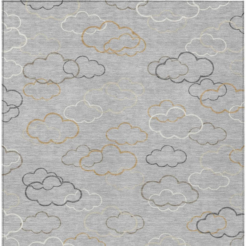 Silver washable indoor outdoor rug with scattered cloud motifs in gray and beige