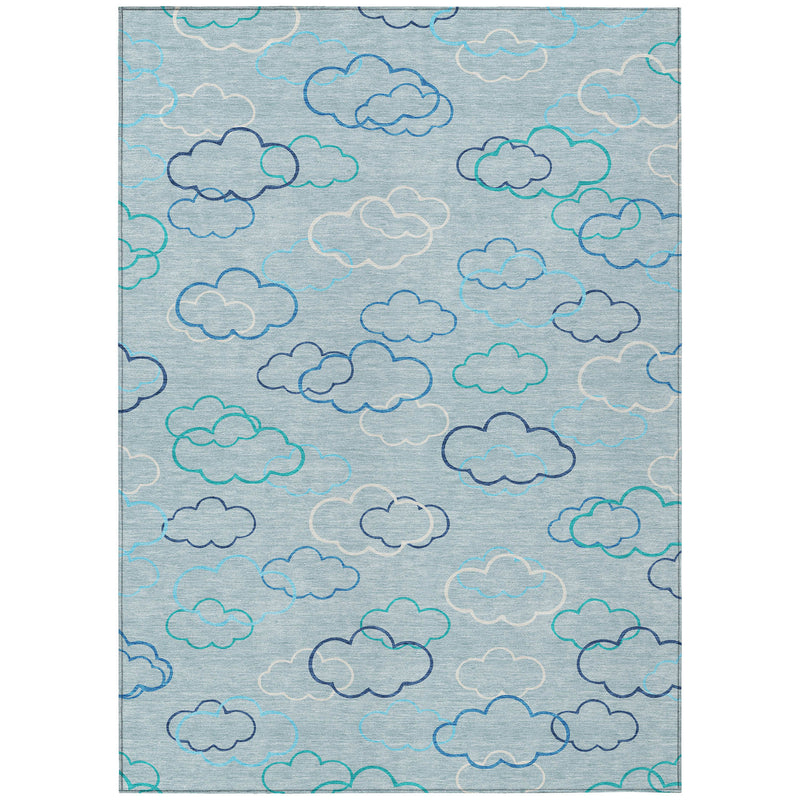 Sky blue area rug with repeating cloud motif in navy and teal outlines