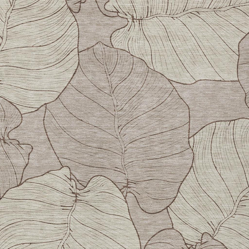 Taupe and beige leaf floral area rug, angled close-up of pattern