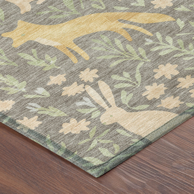 Round rug corner detail with taupe, green leaf pattern and gold-toned animal accents