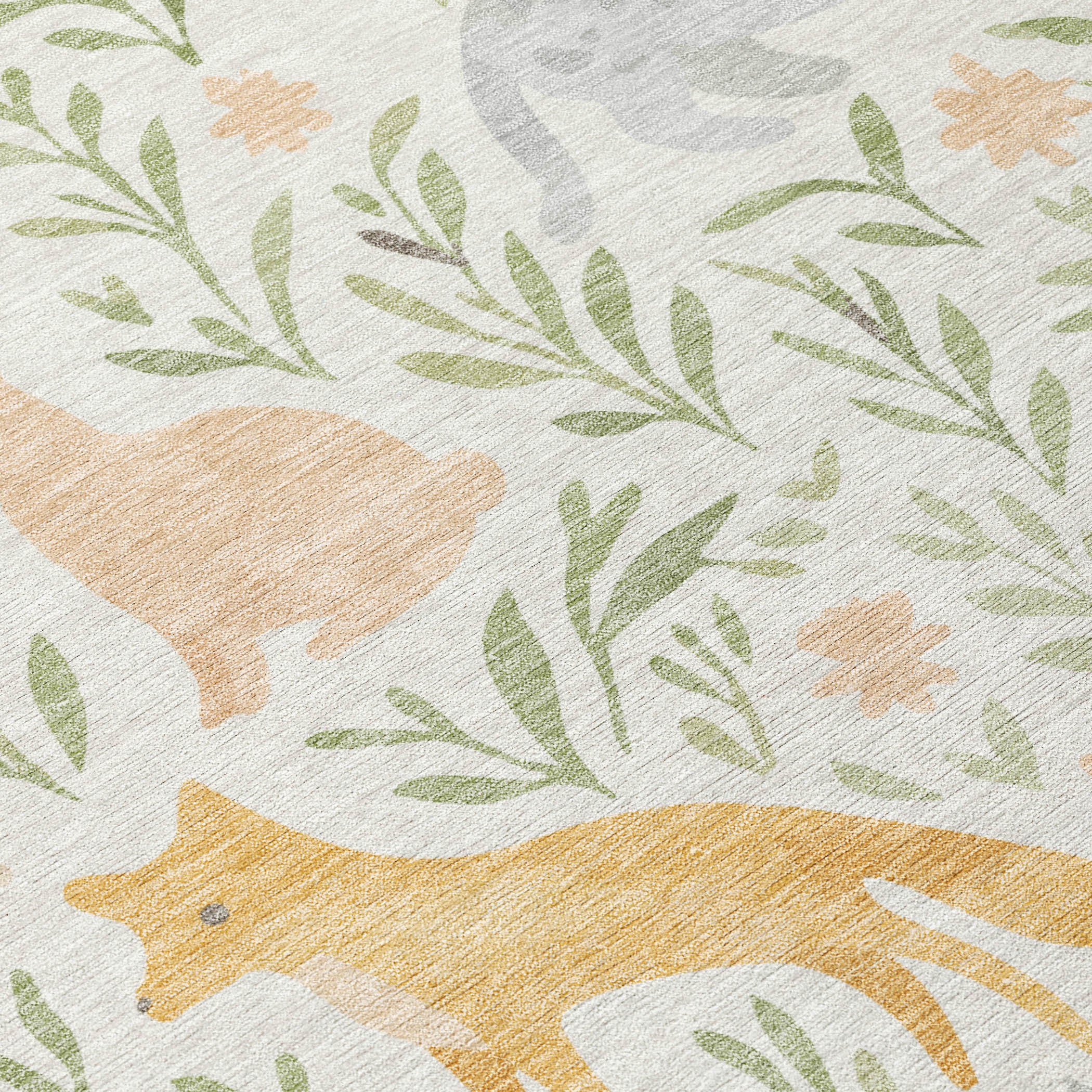 Ivory area rug close-up with green leaf sprigs, gray animals, and tan accents