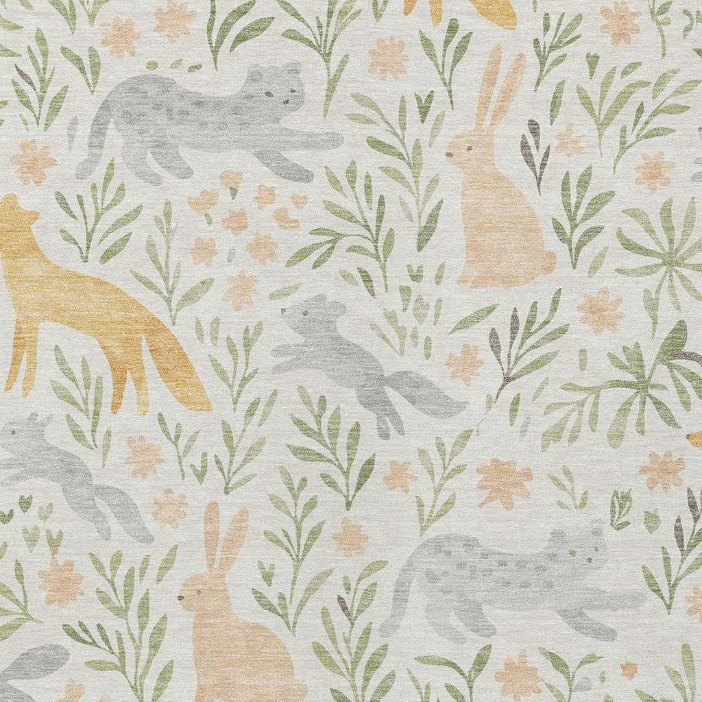 Ivory area rug with gray and tan animal silhouettes and green botanical leaves