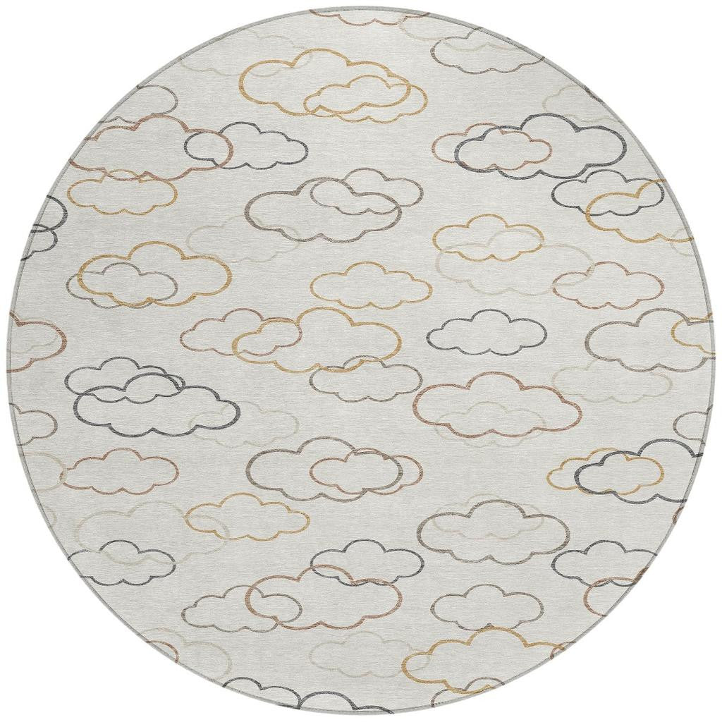 Round area rug with dense cloud outlines in gray, gold, and rust on light base