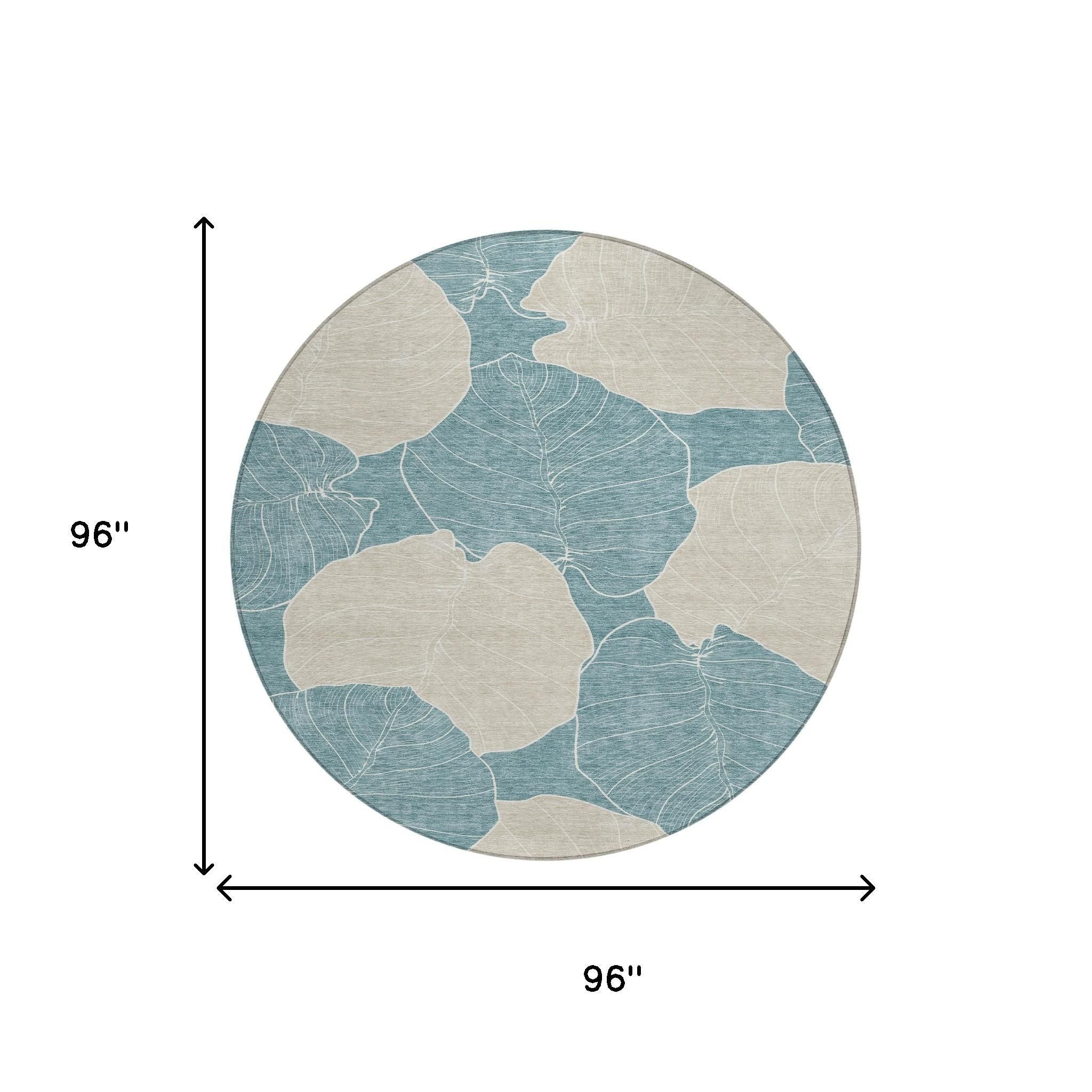 Round teal and ivory leaf-pattern washable indoor/outdoor area rug