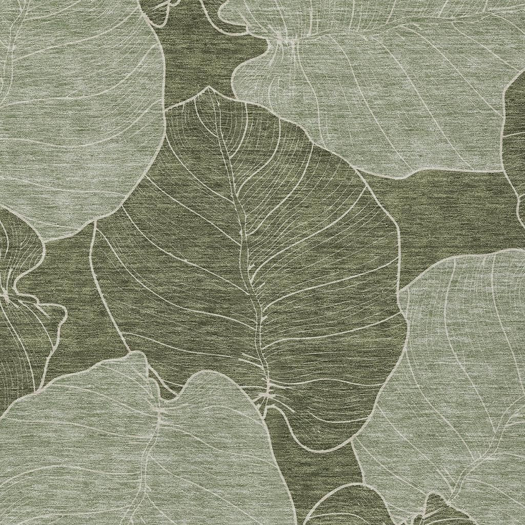 Olive and ivory floral area rug with leaf linework pattern, close-up