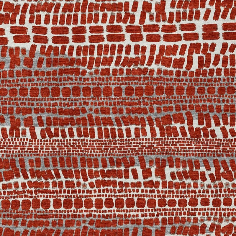 Close-up abstract area rug texture with red brick pattern and gray dashes