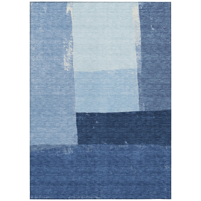 Blue and dark blue geometric patchwork area rug with off-white square center