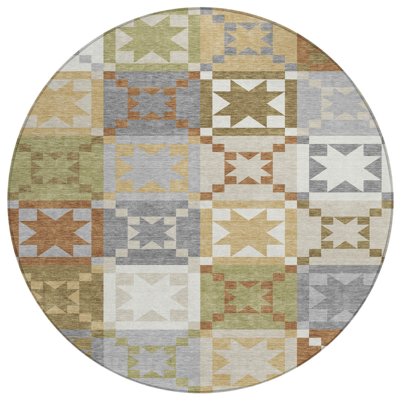 Round patchwork area rug with mosaic squares and star designs in gray, green, beige, and tan.