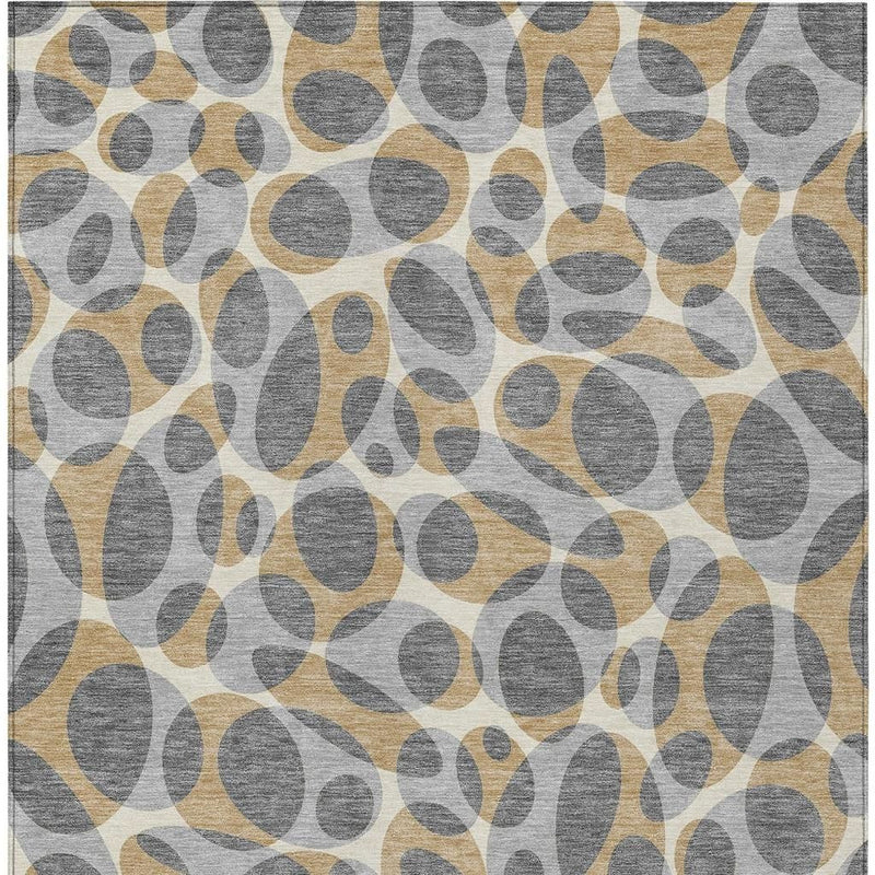 Abstract area rug with gray and beige oval pattern and dark border