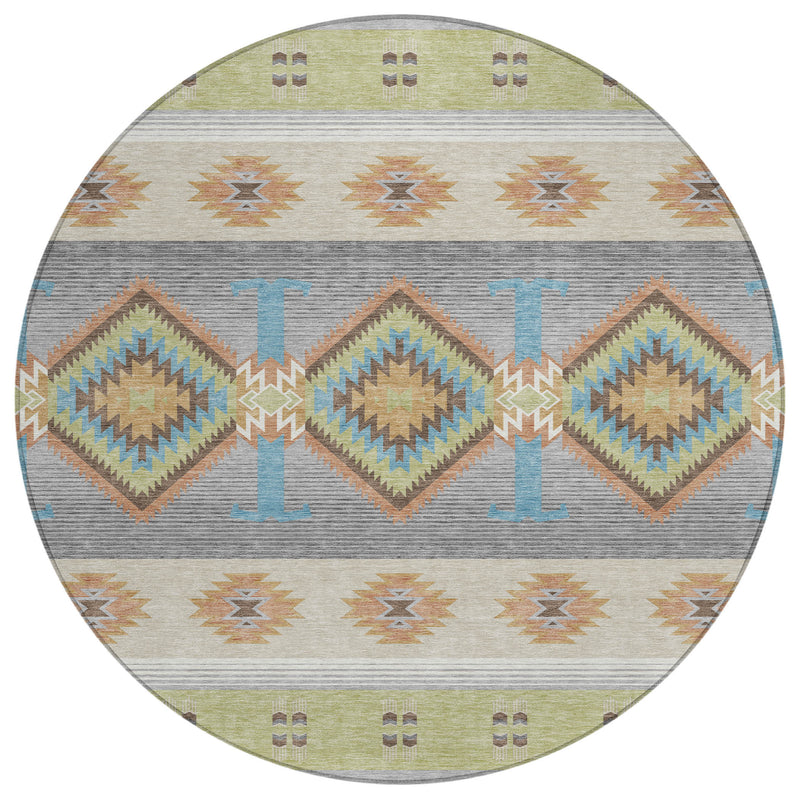 Round area rug with centered diamond medallions and repeating southwestern motifs in green