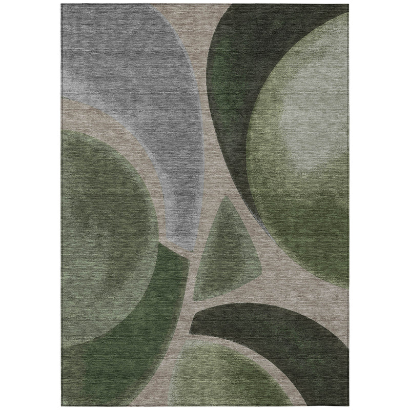 Rectangular area rug with abstract leaf-like green and gray pattern on light ground