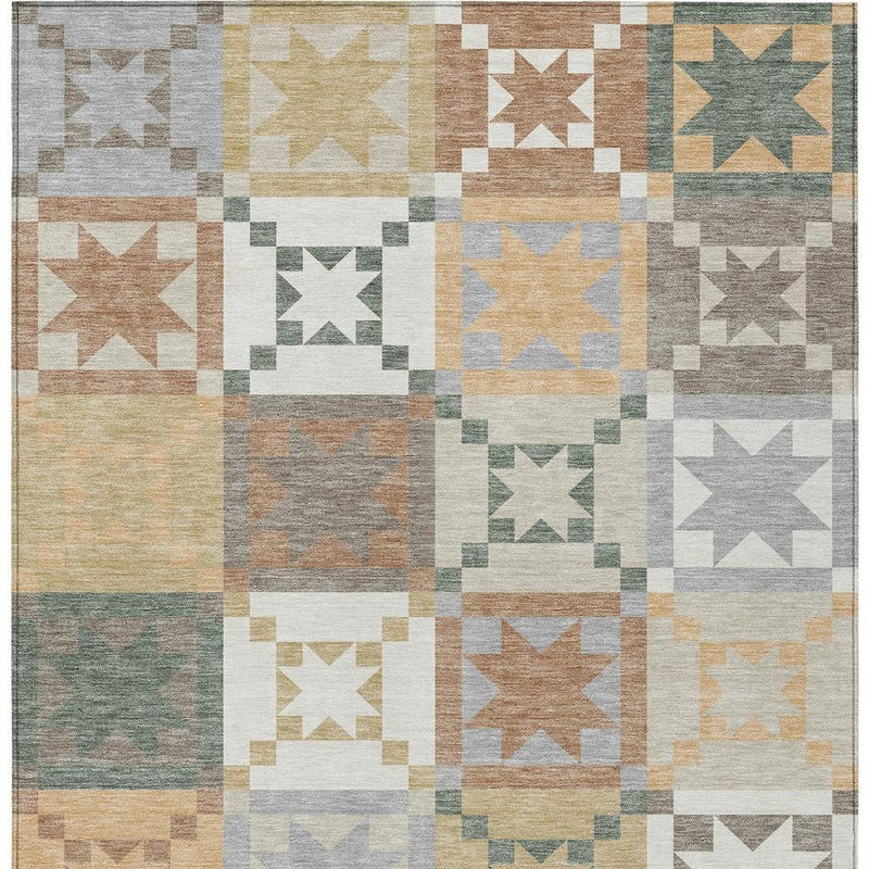 Multicolor patchwork area rug with repeating square star blocks in ivory, silver, and teal