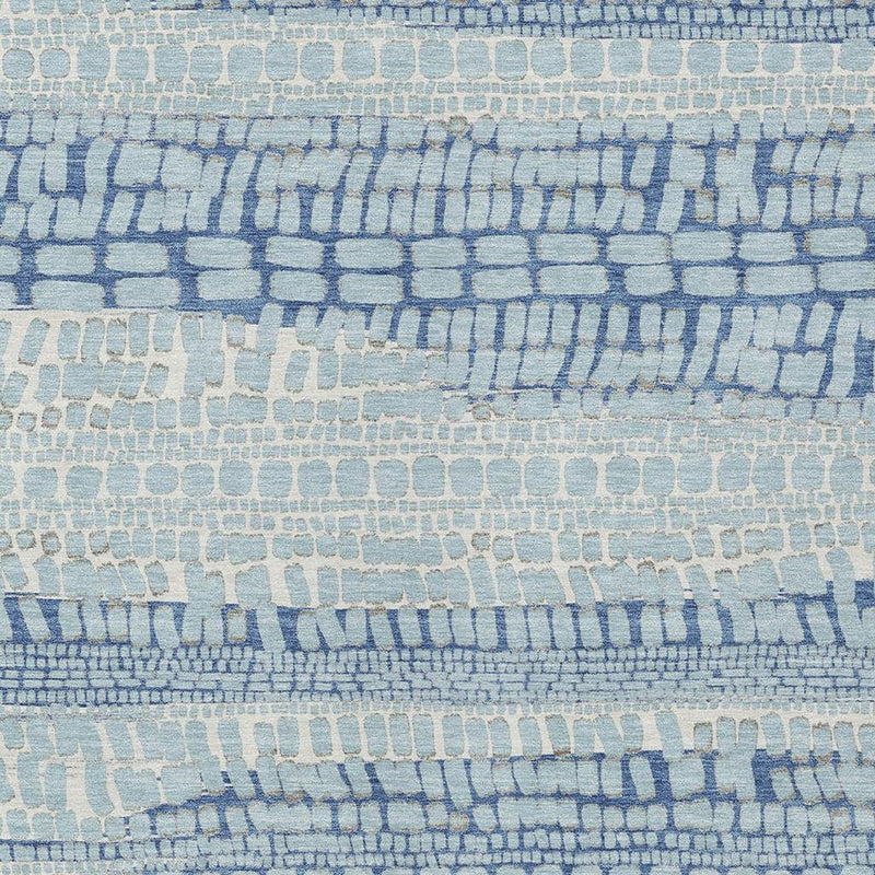 Blue and light blue abstract area rug with dense blocky stripe pattern