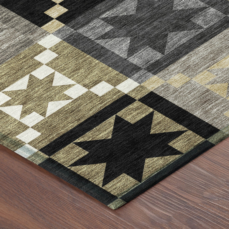 Indoor outdoor patchwork rug on hardwood floor with large star and checker pattern