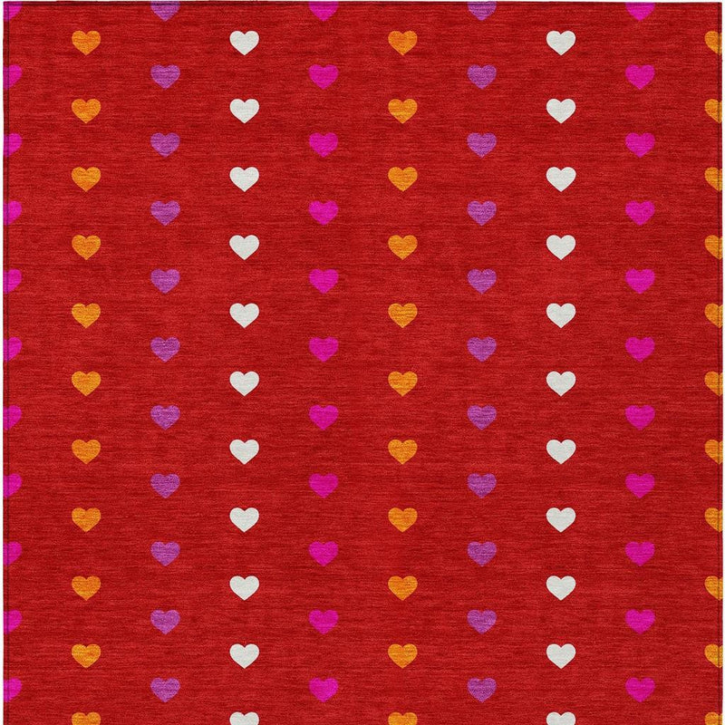 Red heart-pattern area rug with evenly spaced multicolor hearts