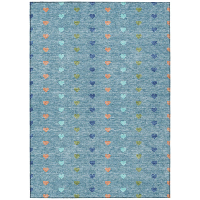 Teal blue area rug with dense repeating hearts in orange, green, purple, and peach