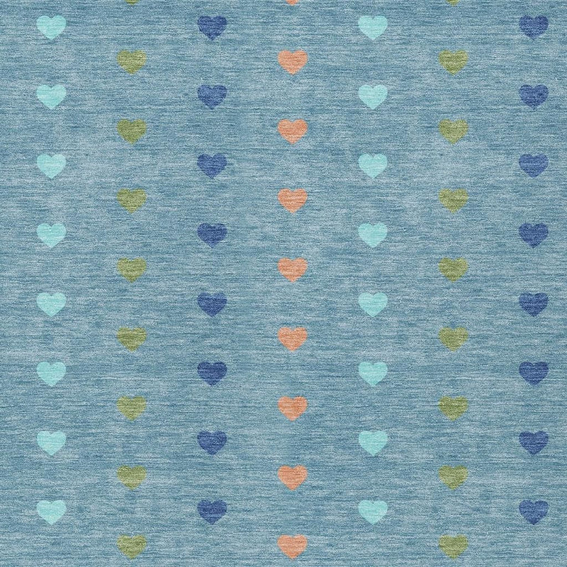 Teal blue area rug with repeating multicolor hearts pattern