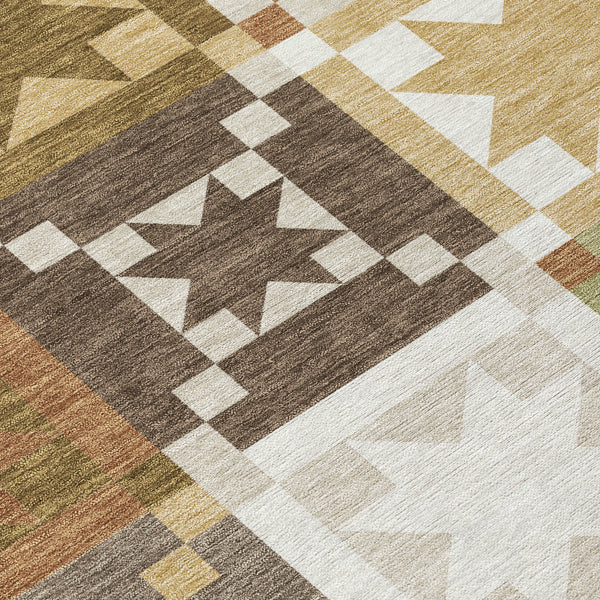 Geometric patchwork area rug with brown, green, and cream squares and stars