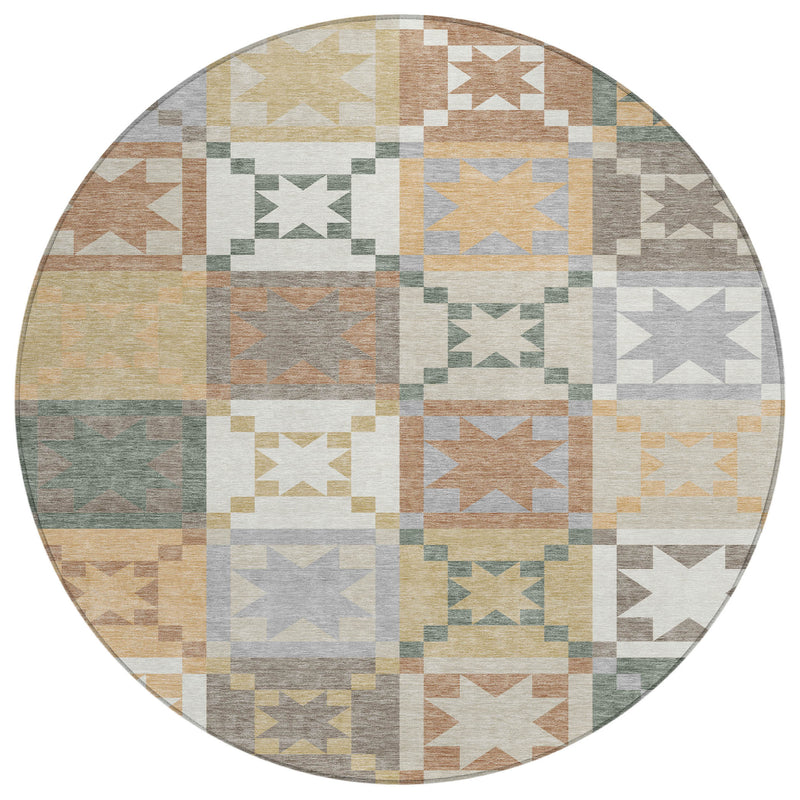 Round patchwork area rug with geometric star blocks in ivory, gray, tan, and blue-green