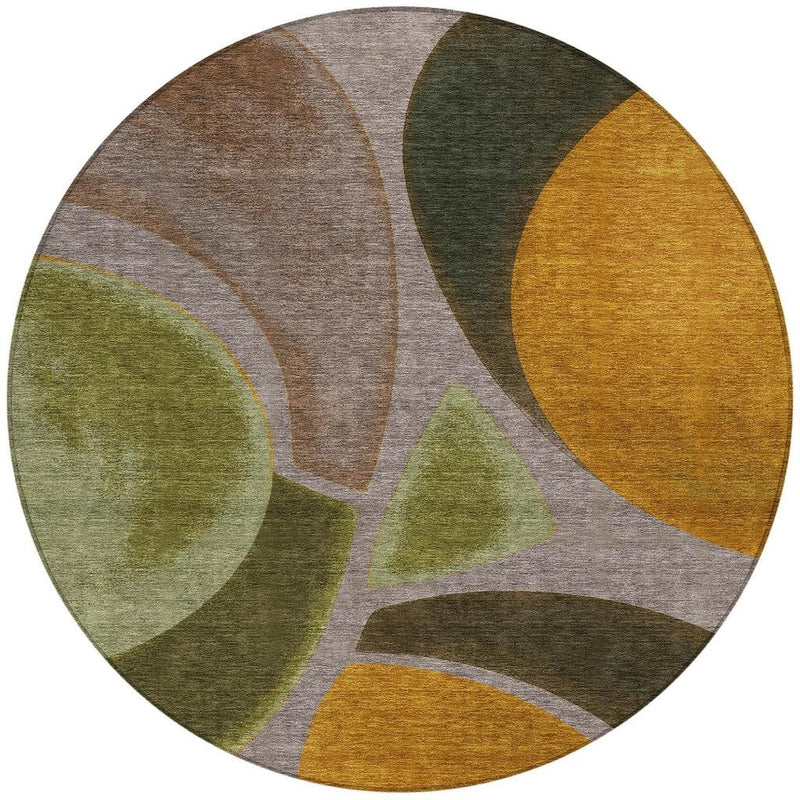 Round abstract area rug with layered curved shapes in taupe, green, brown, and gold