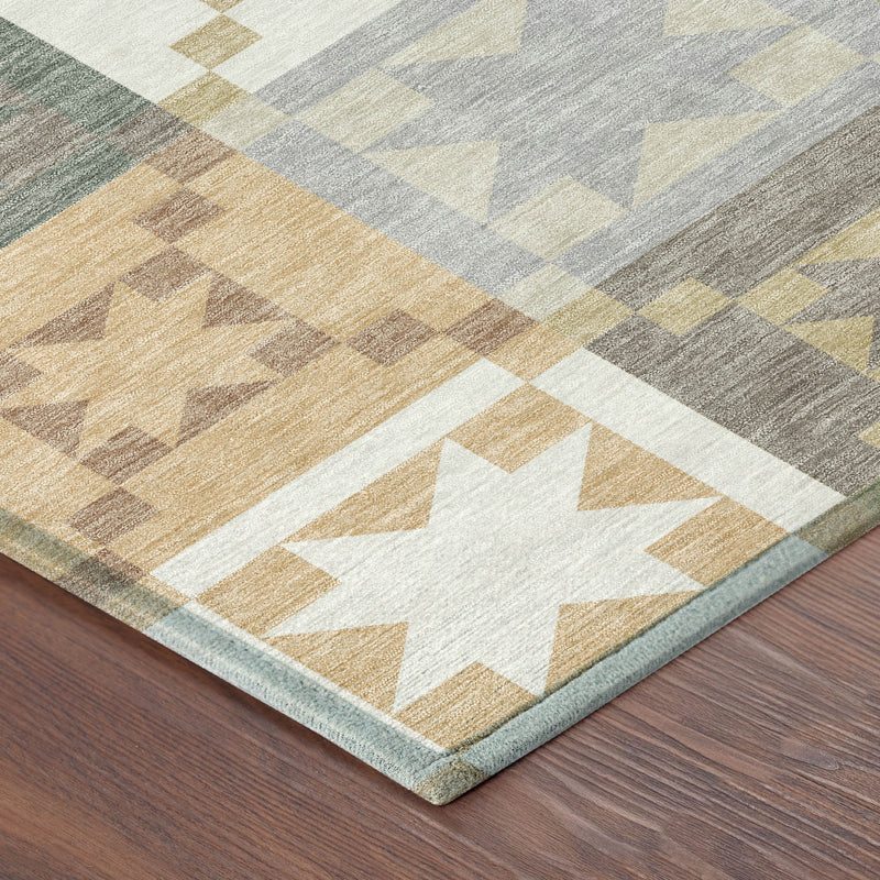 Area rug edge on hardwood floor; patchwork stars in ivory, silver and muted earth tones
