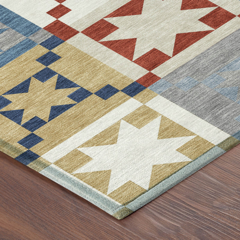 Patchwork rug corner with large white star, red and blue accents, and textured weave.