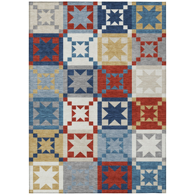 Patchwork area rug with repeating star squares in blue, red, gray, and gold tones.