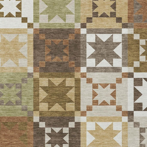 Patchwork area rug with star blocks in brown, green, tan, and white
