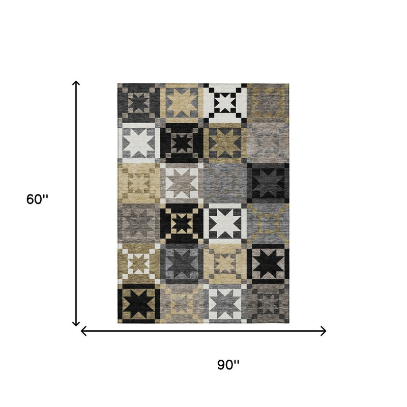 Measuring view of patchwork area rug, 90 in by 60 in, geometric stars in gray and black