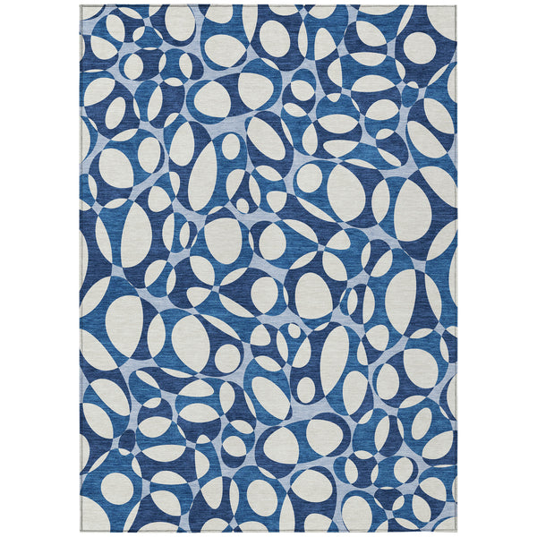 Blue and navy abstract area rug with geometric oval pattern, rectangular border