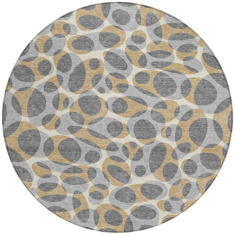 Round abstract area rug with gray ovals and beige accents on a light background