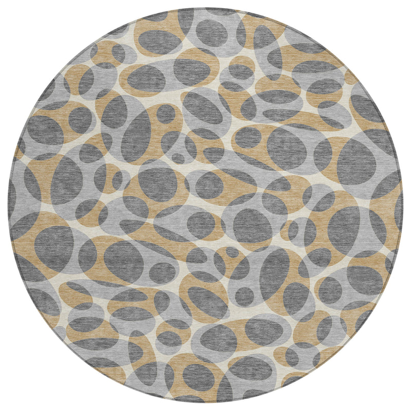 Round area rug with repeating gray oval shapes and beige highlights on light ground