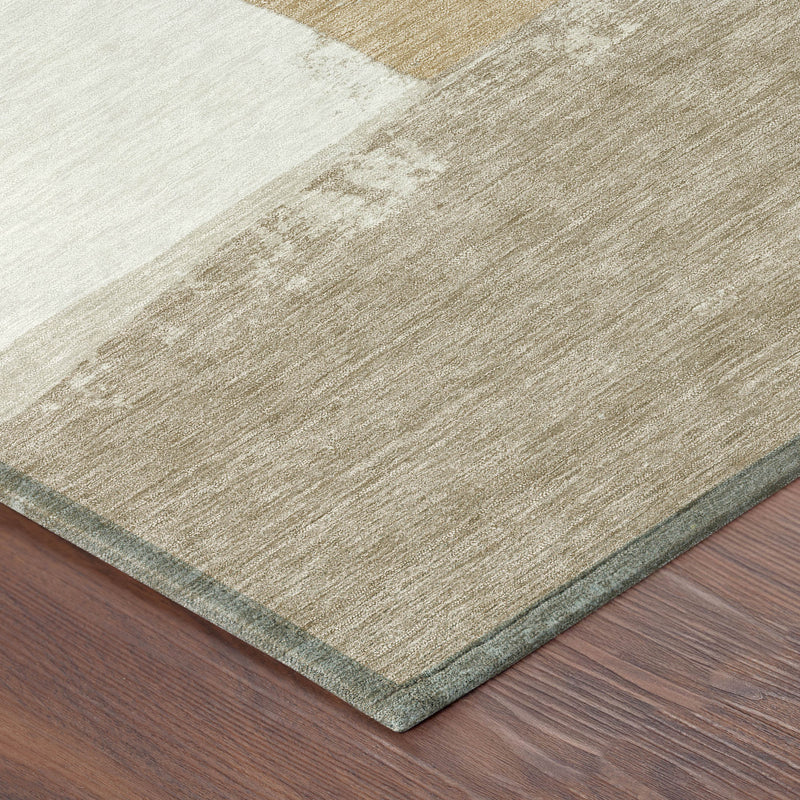 Corner view of round area rug with textured beige, gray, and ivory panel design
