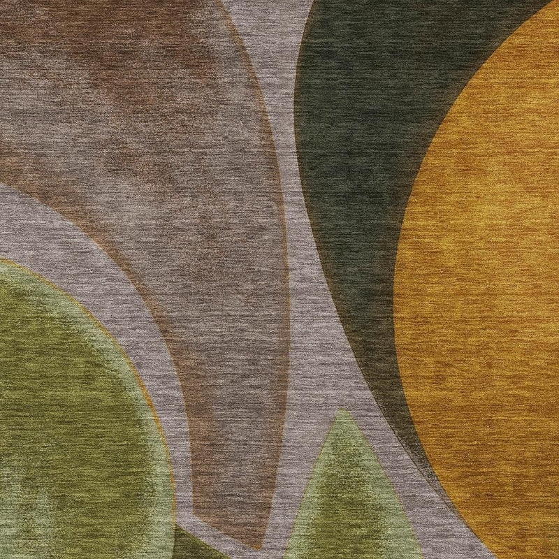 Abstract rug close-up with textured taupe, dark green, ochre and gray curved shapes.