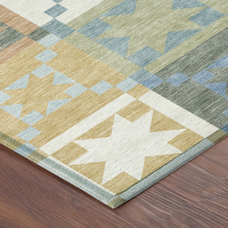Corner view of blue and green patchwork rug with star and check blocks