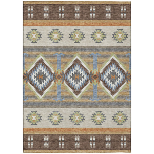 Southwestern area rug with brown, copper, and light-blue geometric motifs
