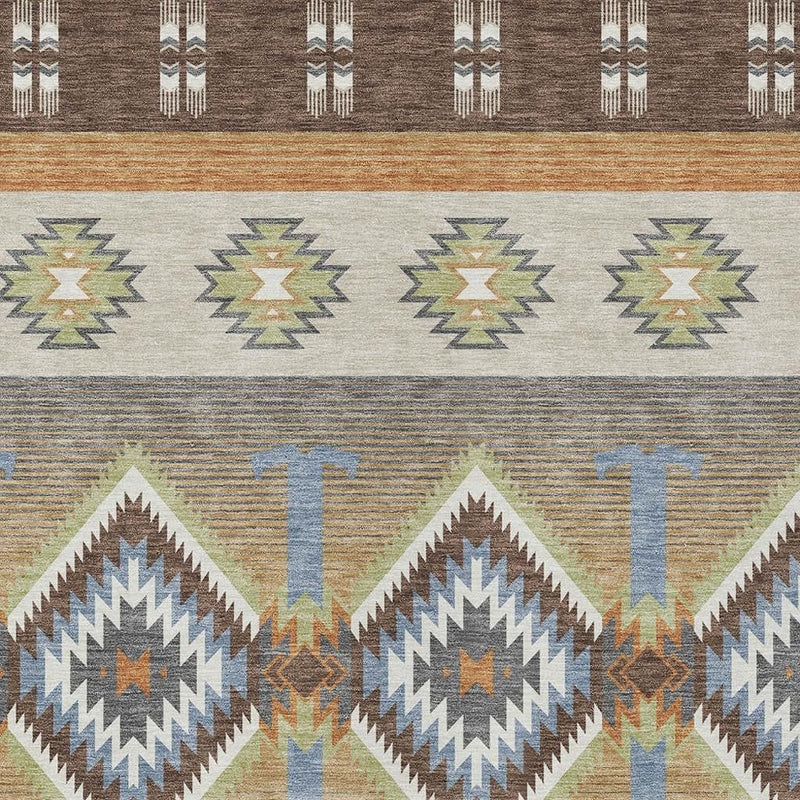 Southwestern rug close-up with brown border and cream, green, and blue zigzag motifs