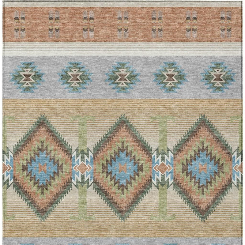 Copper and silver southwestern area rug with repeating medallions in rows