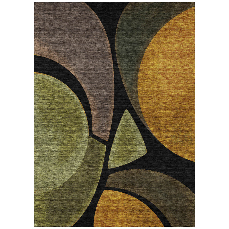 Abstract area rug with black geometric arcs and green, gray, and mustard yellow sections