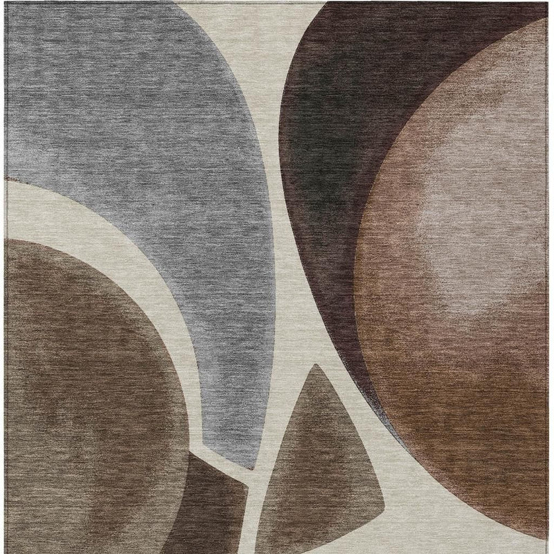 Rectangular abstract area rug with gray, brown, and beige curved motifs