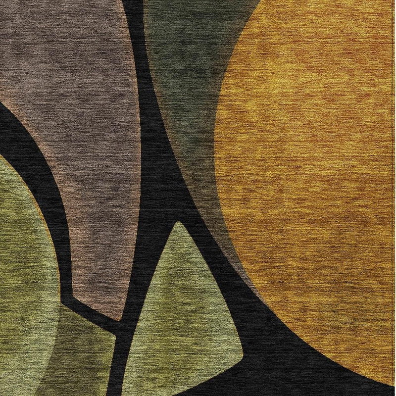 Abstract rug close-up with green and gold curved panels over dark black lines.
