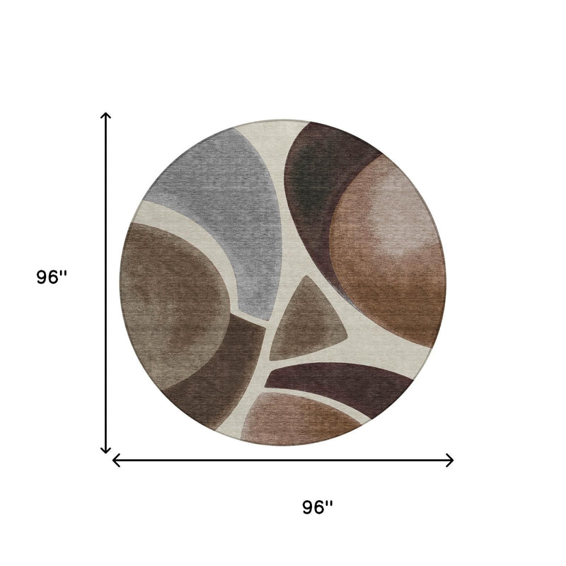 Round abstract area rug, 96 in diameter; gray, beige, and brown pattern
