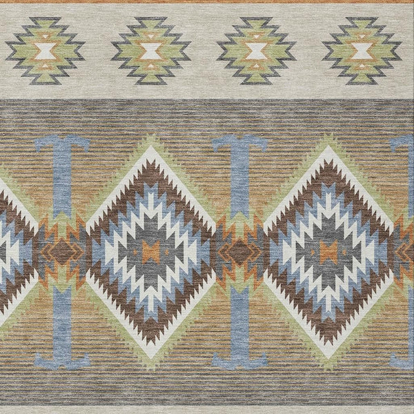 Southwestern geometric area rug with blue, tan, brown and copper accents
